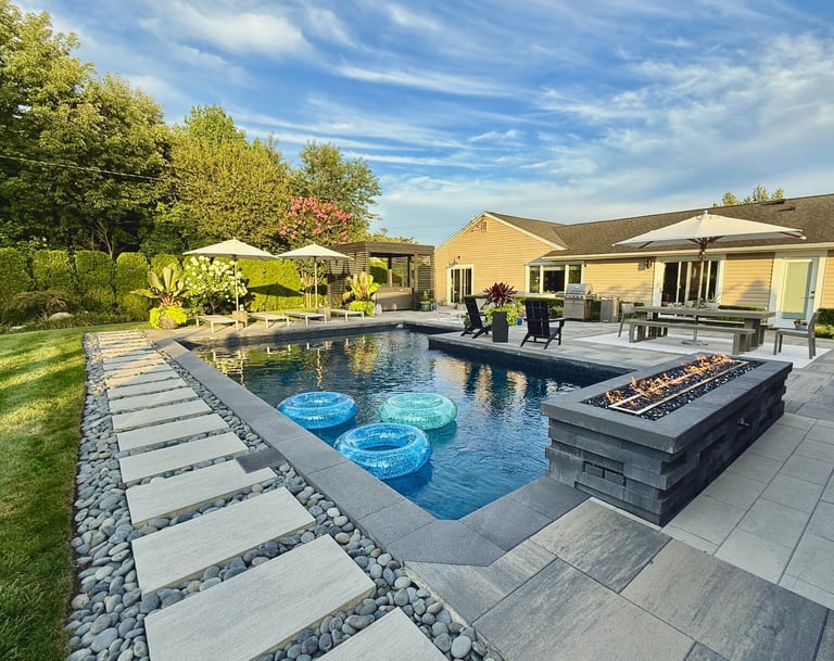 Beautiful backyard with pool and landscaping